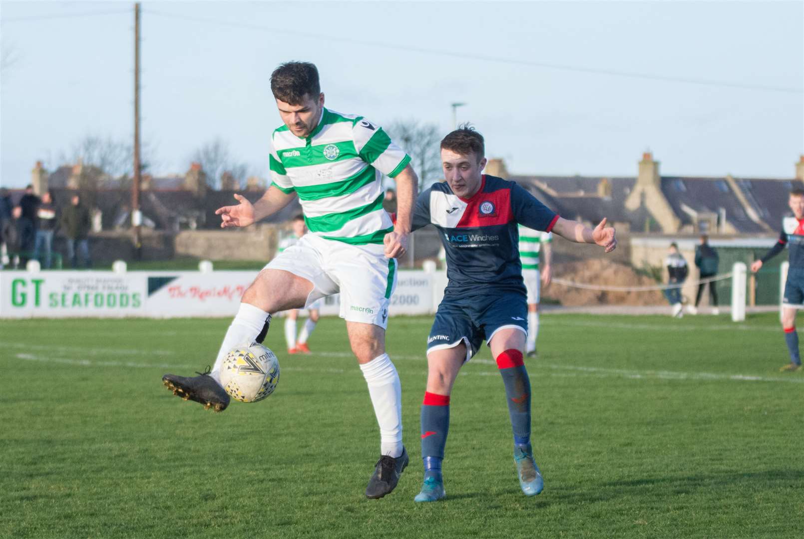 Andy MacAskill with Adam Cross...Buckie Thistle v Turriff United at Victoria Park, Buckie. ..Picture: Becky Saunderson..