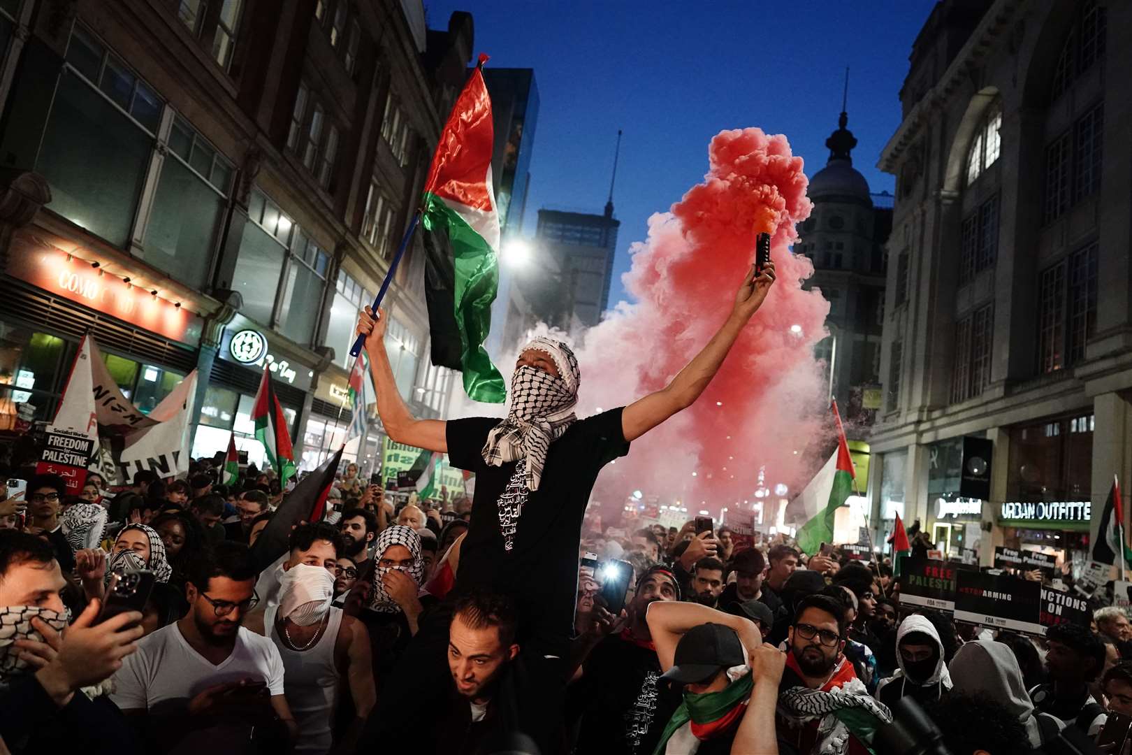 Protesters at a Palestine Solidarity Campaign demonstration near the Israeli embassy (Jordan Pettitt/PA)