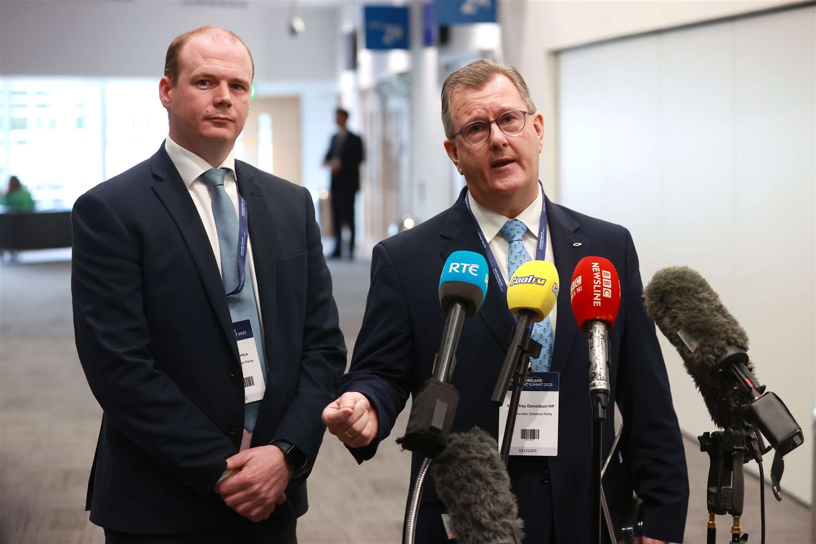 DUP leader Sir Jeffrey Donaldson, right, spoke with the media during the event (Liam McBurney/PA)