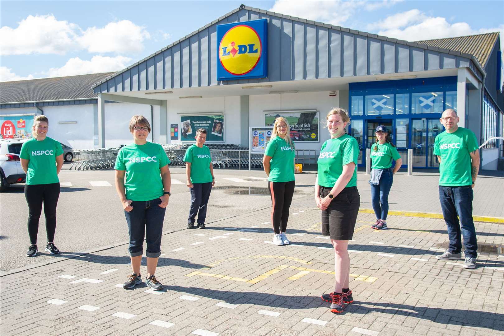 Staff from Buckie Lidl (pictured) and their colleagues from Elgin have raised thousands of pounds for the Scottish NSPCA. Picture: Daniel Forsyth