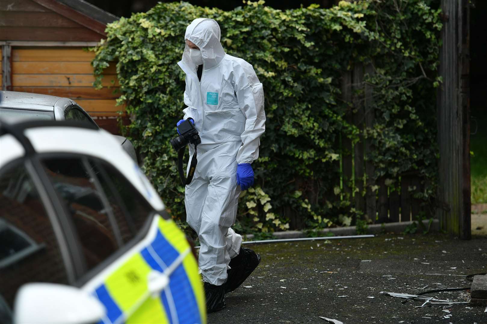 A forensics investigator outside a property in Selly Oak, Birmingham (Jacob King/PA)