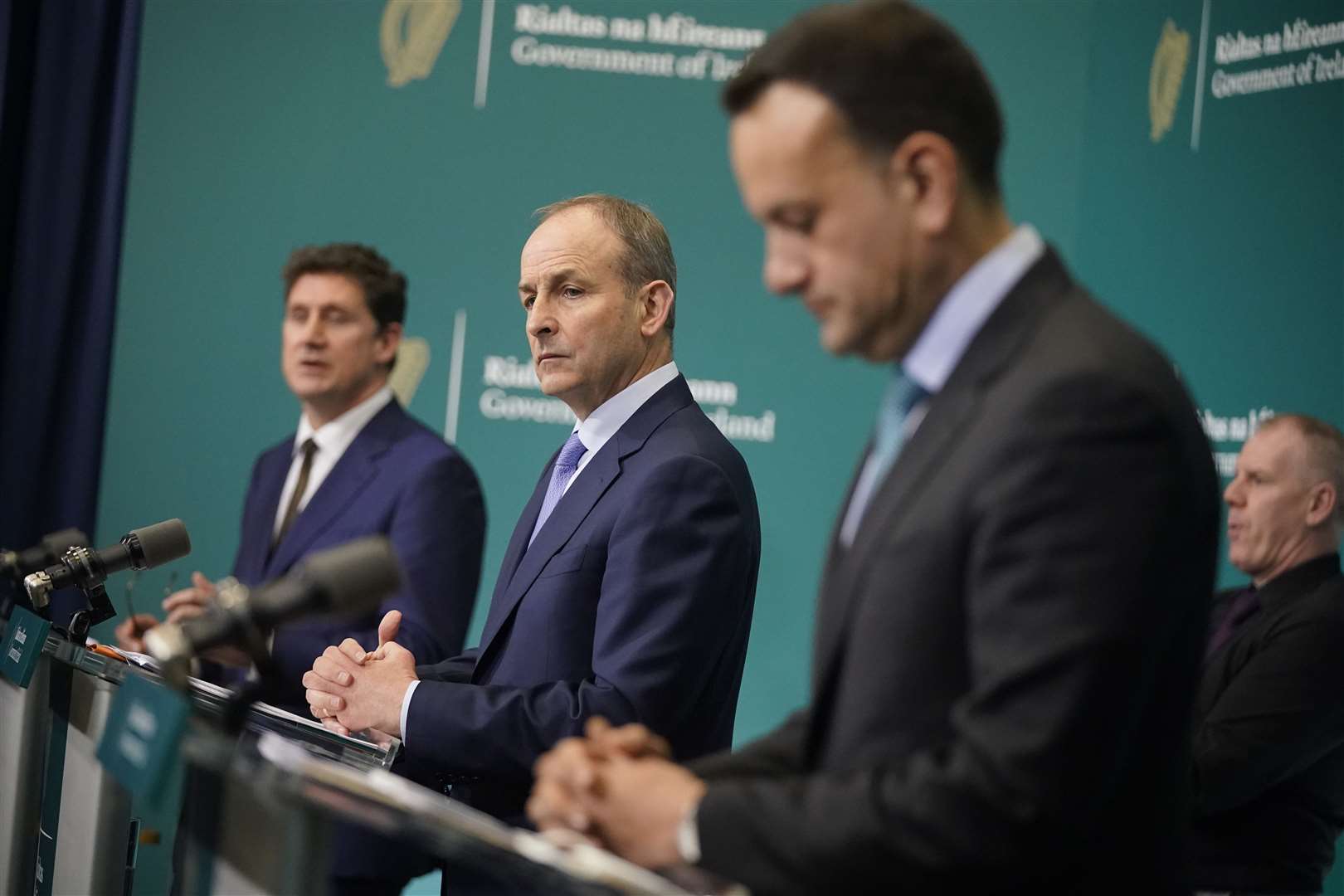 Green Party leader Eamon Ryan, Micheal Martin and Leo Varadkar agreed to enter coalition government together in 2020 (Niall Carson/PA)