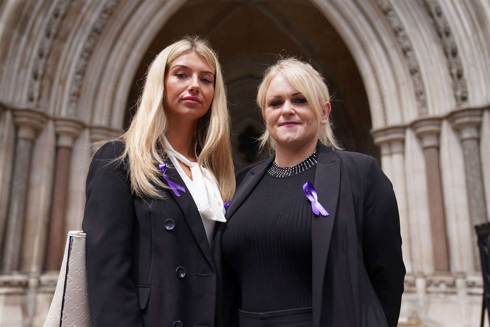 Archie Battersbee’s mother Hollie Dance (right) and family friend Ella Carter, outside the High Court during an earlier hearing (PA)