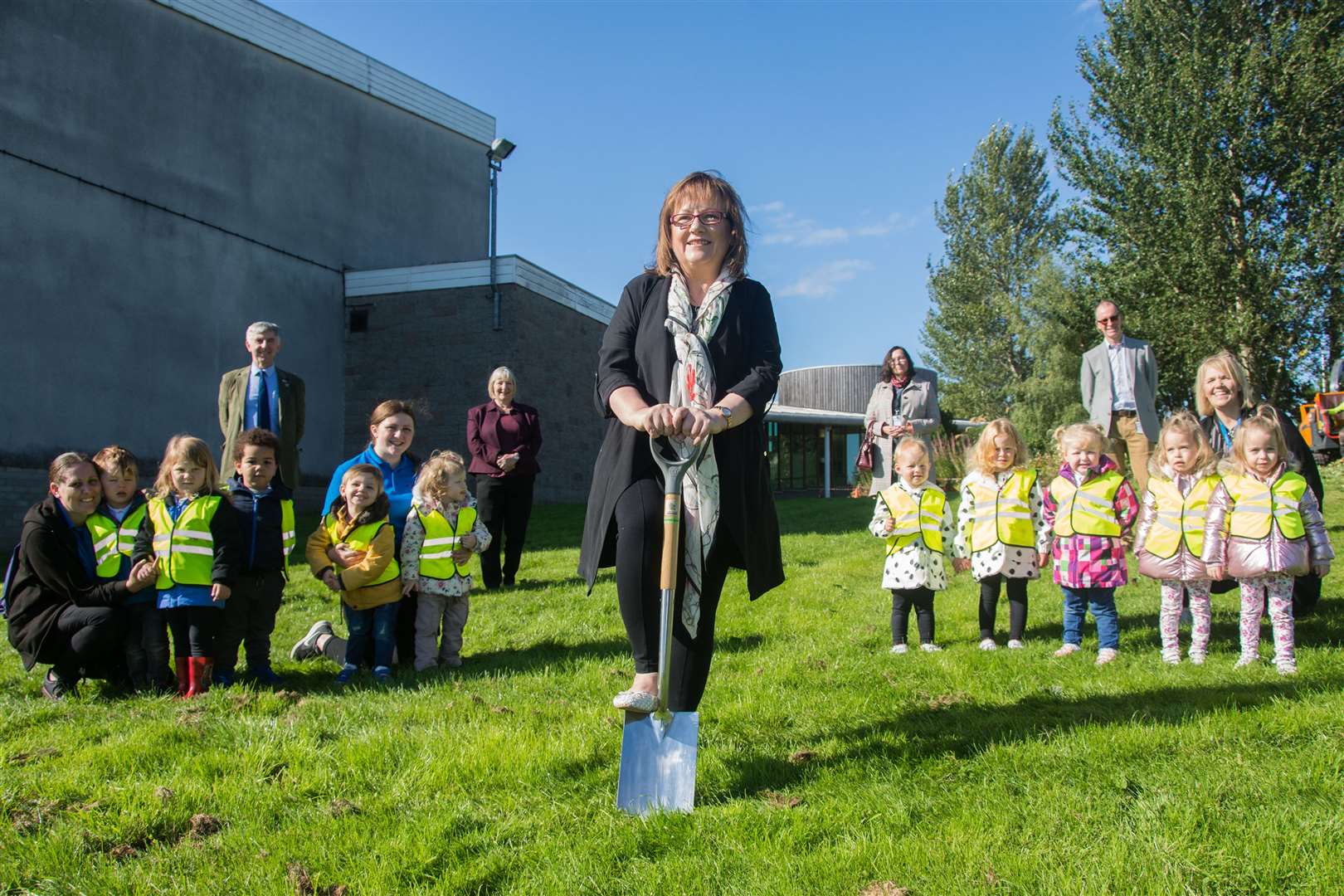Cllr Sonya Warren, Chair of the Children and Young Peopleâs Services Committee (front) cuts the first turf for the new nursery building in Keith. ..Joining her are (from back left) Cllr Donald Gatt, Cllr Teresa Coull, Cllr Laura Powell and Project manager for ELC expansion Robin Paterson and Eleanor Smith (kneeling right) Nursery Manager for Flexible Childcare Services...Picture: Becky Saunderson..