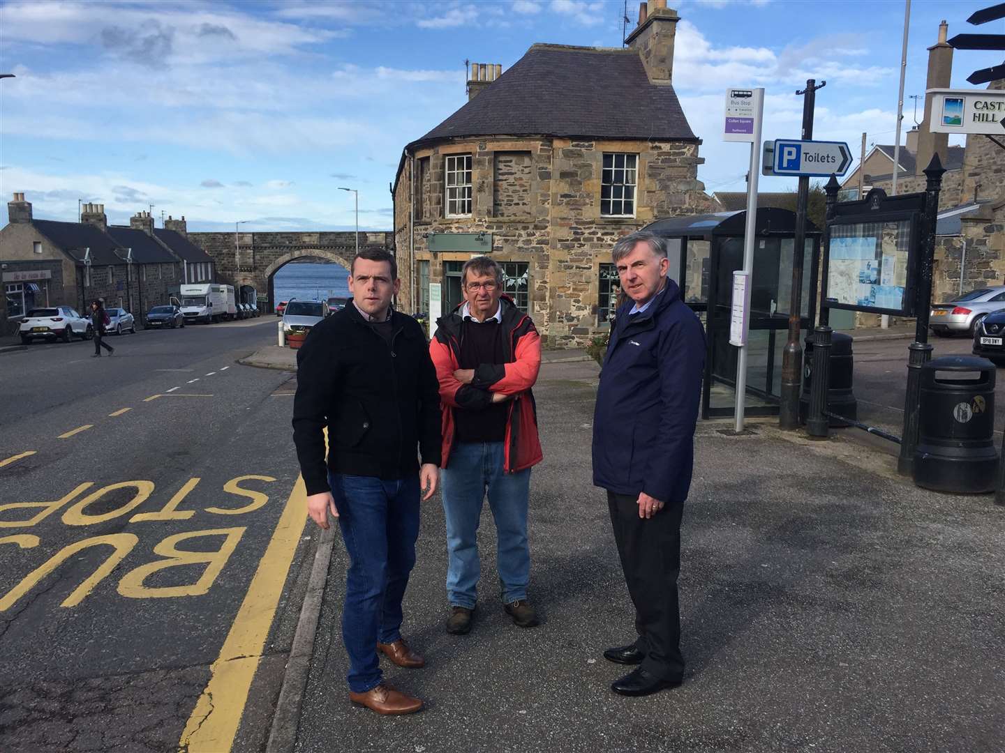 Discussing possible sites for a new cash machine are (from left) Douglas Ross MP, Stan Slater and Councillor Donald Gatt.