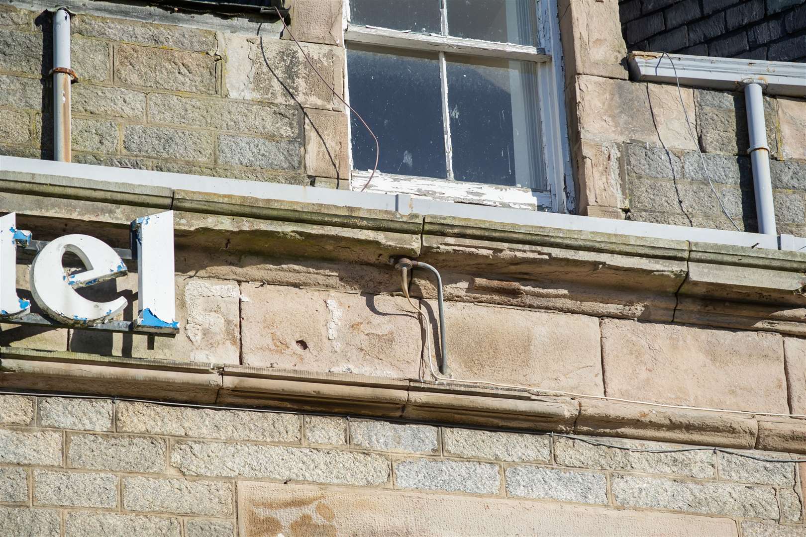 Loose wires and rotten windows on the Huntly Hotel. Picture: Daniel Forsyth.