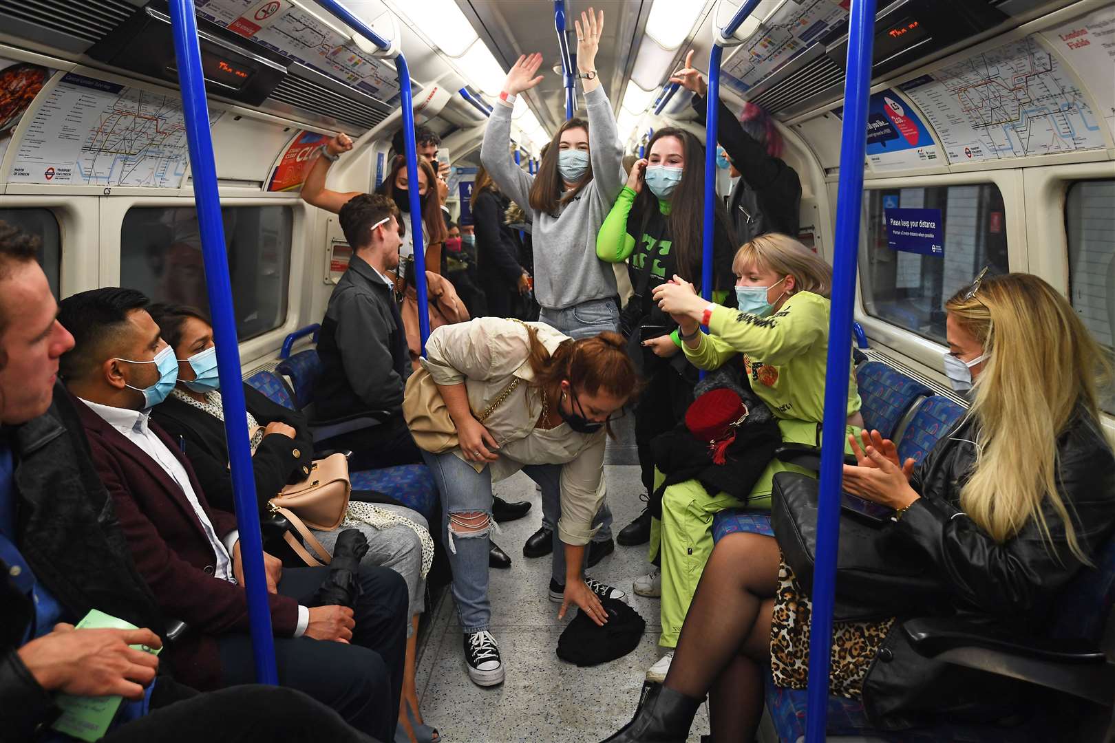 Passengers on a Northern Line train in London on Saturday night (Victoria Jones/PA)