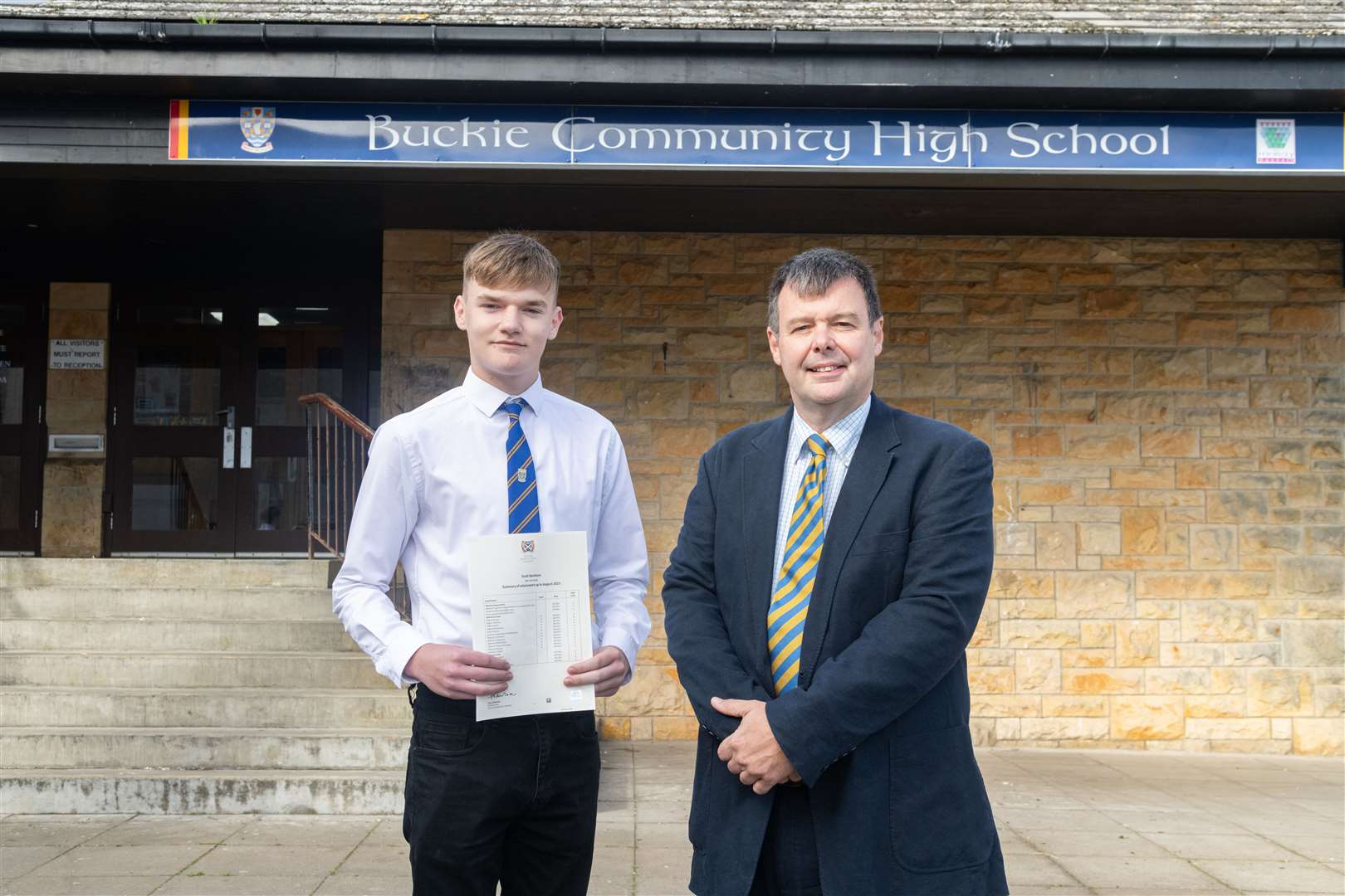 Scott Davidson is congratulated on his five A grades at Higher by BCHS Rector Neil Johnson. Picture: Beth Taylor