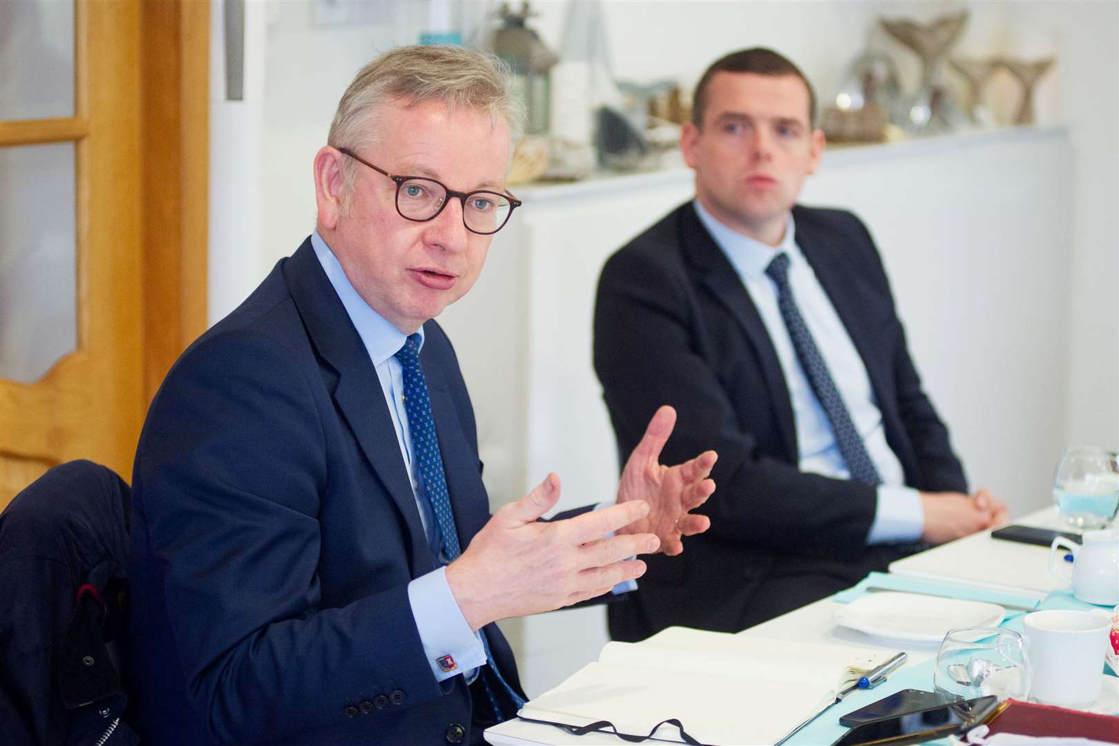 Michael Gove (left) and Moray MP Douglas Ross (right) together in Buckie. Picture: Daniel Forsyth