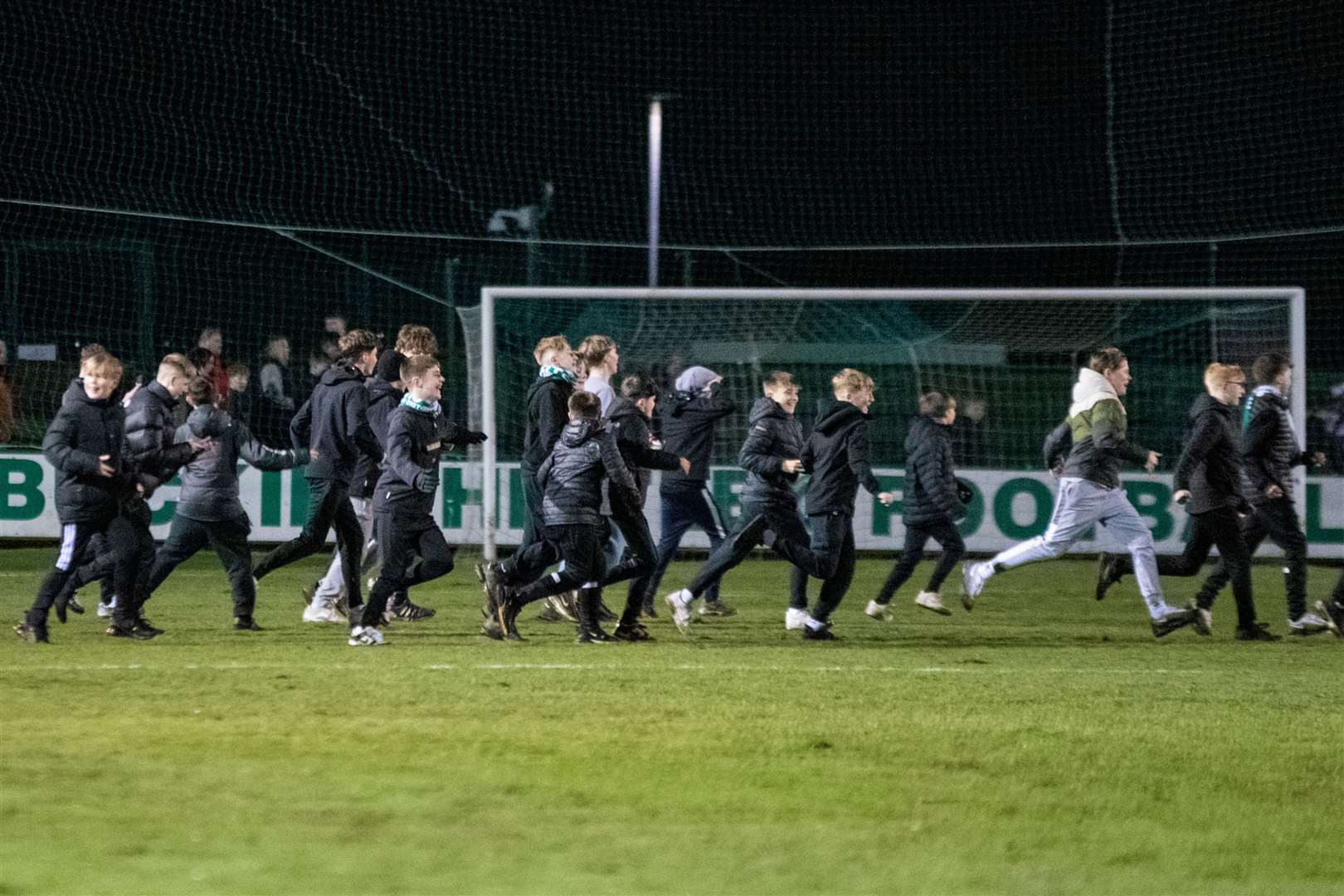 A number of fans ran on to the pitch at full-time.Picture: Daniel Forsyth.