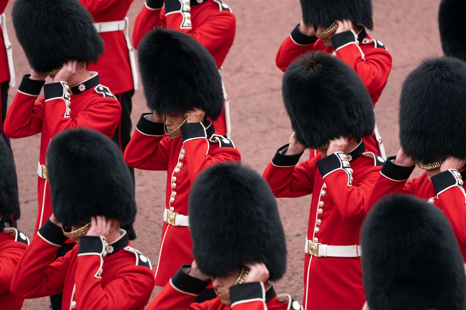 The King’s Guard continues to wear bearskin hats as part of their ceremonial dress (Joe Giddens/PA)