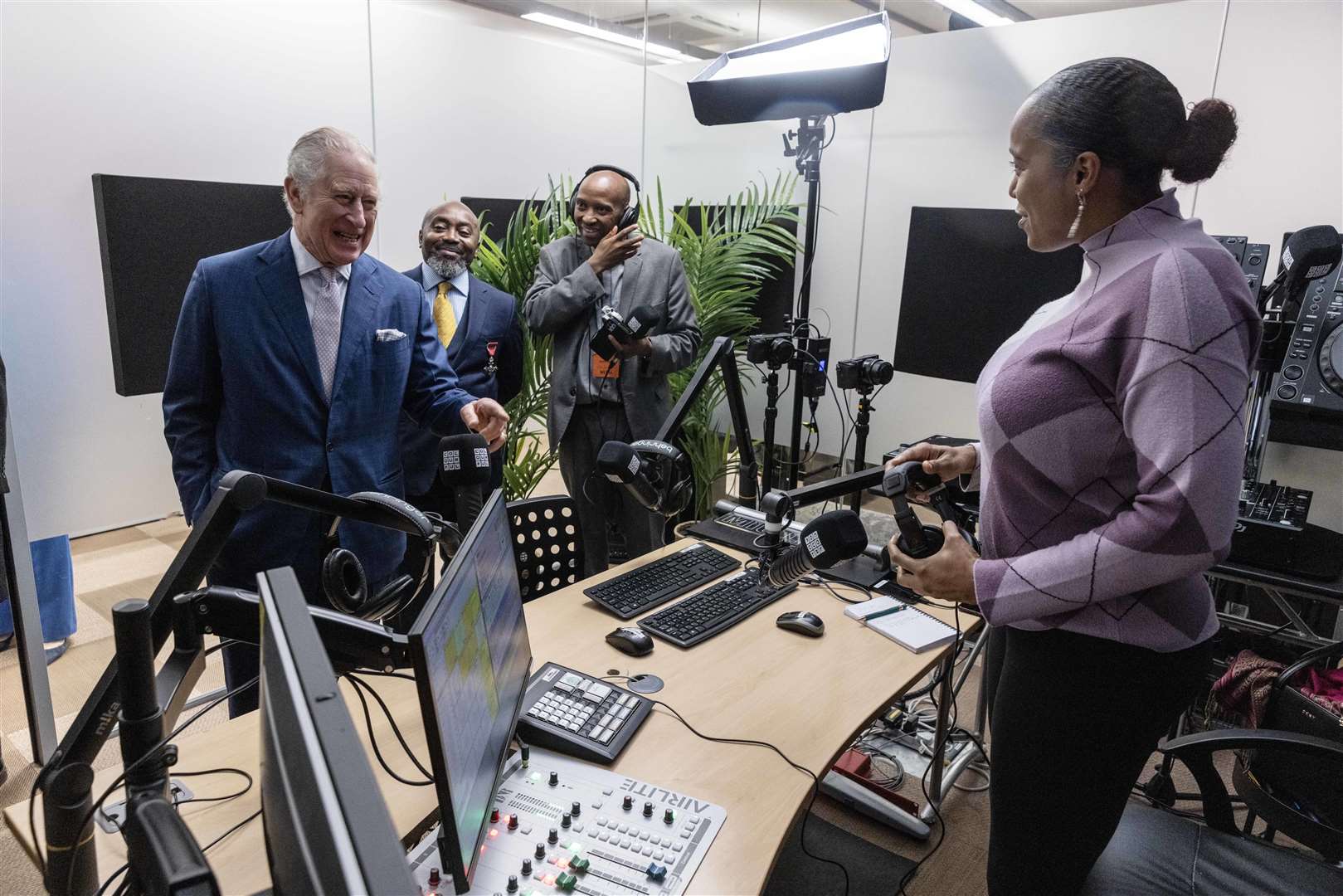 The King meets Selene Jordan in the Radio Colourful studio (Jack Hill/The Times/PA)