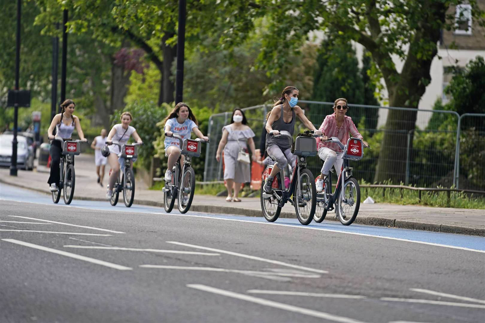 Just under 40% of people said they have made travel changes such as cycling more and flying or driving less (Aaron Chown/PA)