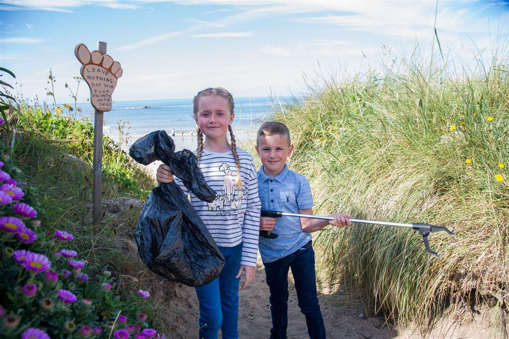 Harry and Polly Williams, from Elgin, are clearing litter from local beaches every week and are raising money for Sea Shepherd UK. Picture: Becky Saunderson.