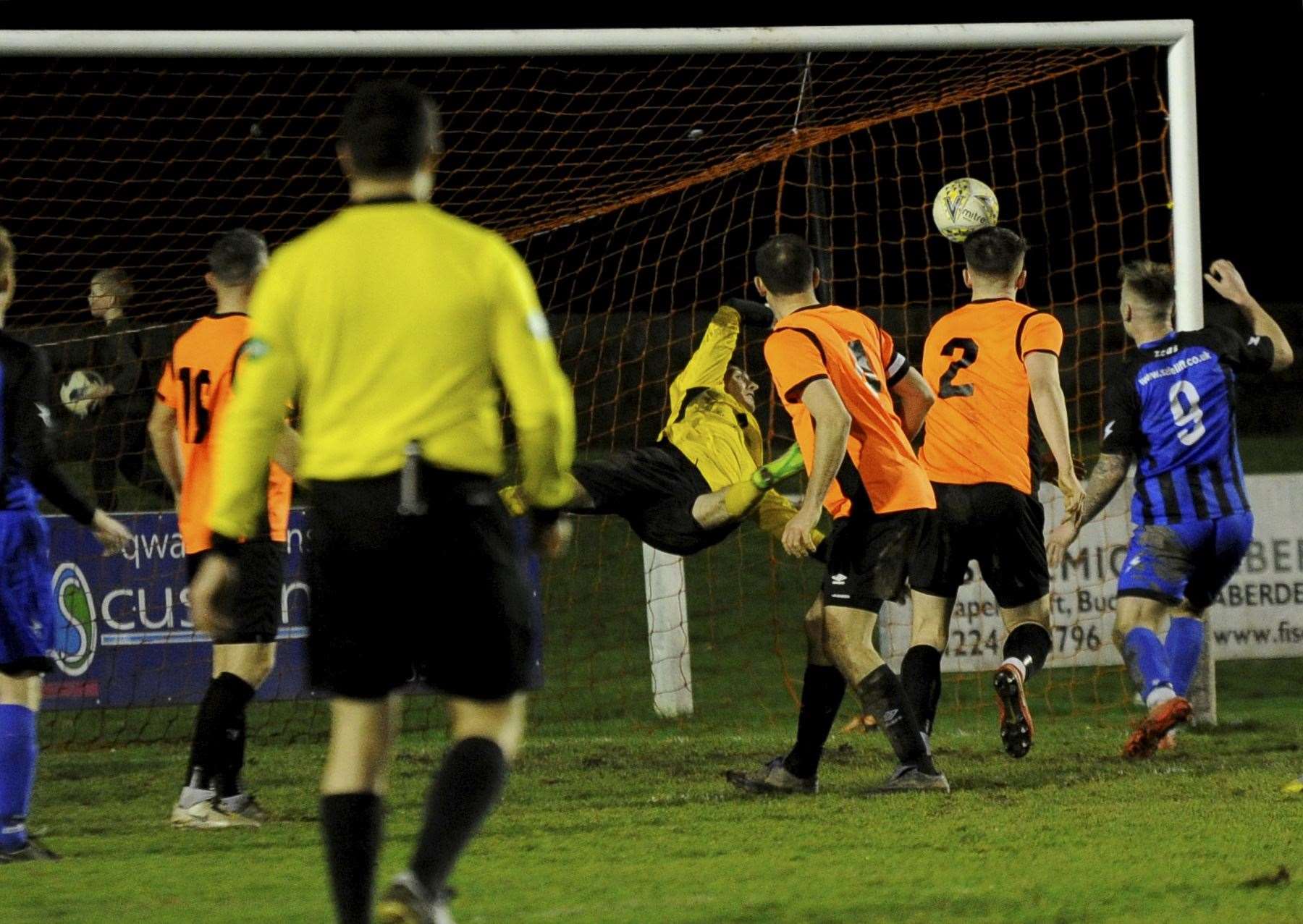 Rothes keeper Ewen Macdonald pulls off a spectacular save to keep this header from Ross Still out. Picture: Eric Cormack