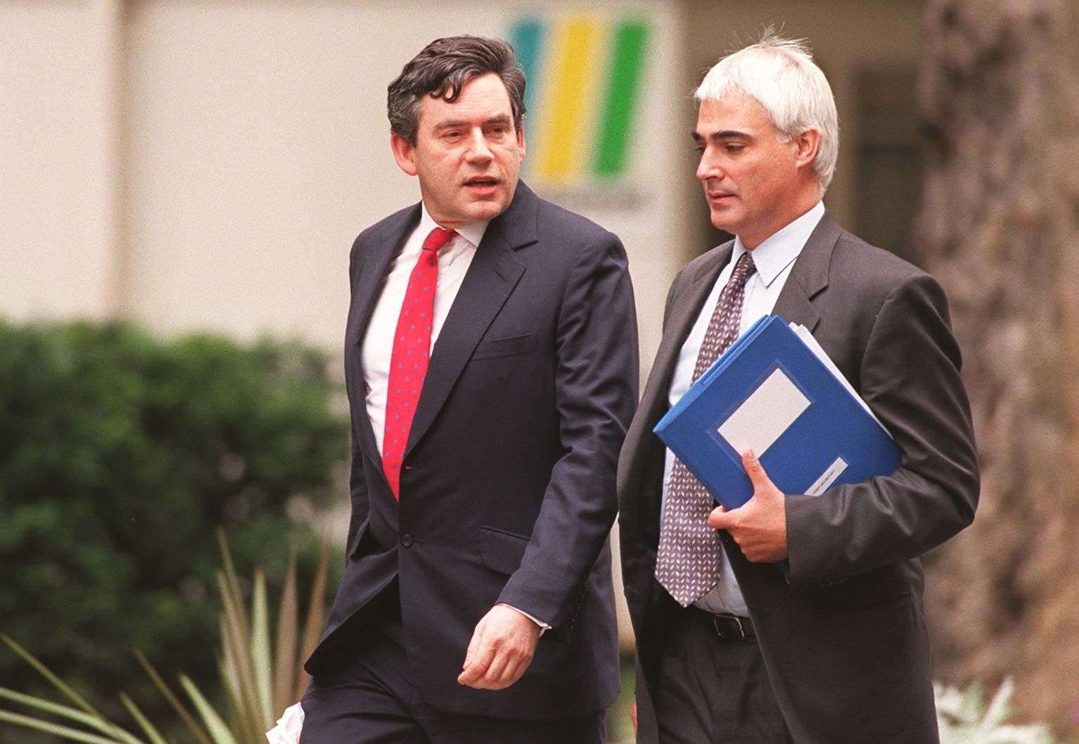 Mr Darling, right, served in both the Gordon Brown, left, and Tony Blair administrations (John Stillwell/PA)
