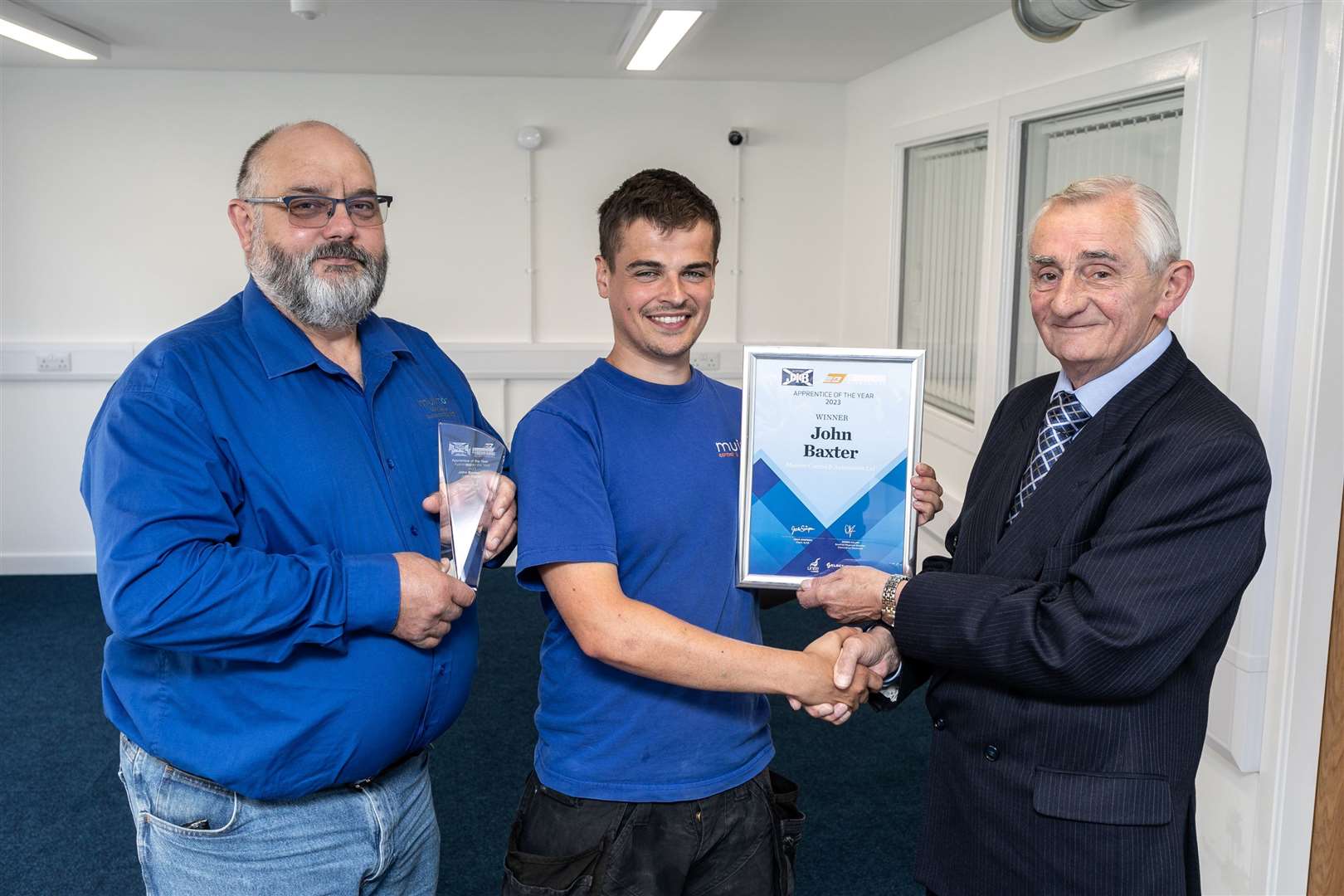 Apprentice of the Year John Baxter with Ewen McDonald (left) from employer Muirton Control and Alick Smith from the Scottish Joint Industry Board.