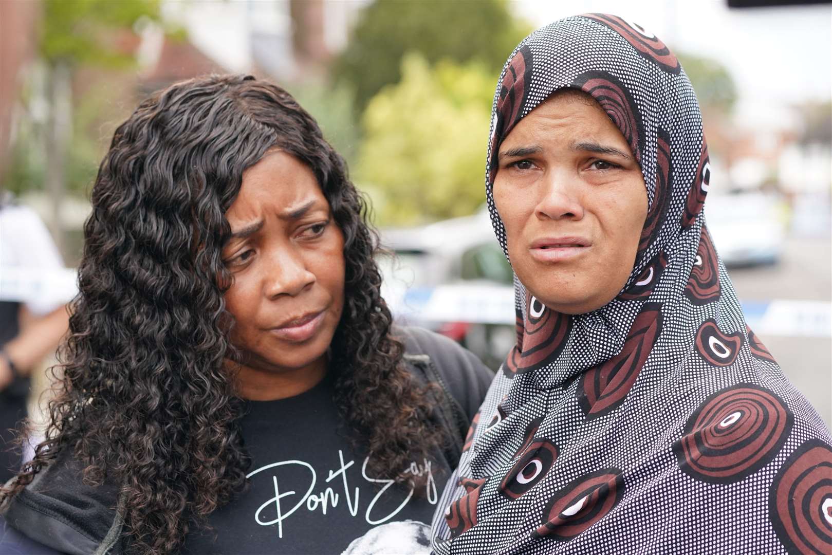 Pastoress Lorraine Jones with Kimberly Alleyne (right), 49, who said her daughter was the fiancee of the man shot in Streatham Hill (Jonathan Brady/PA)