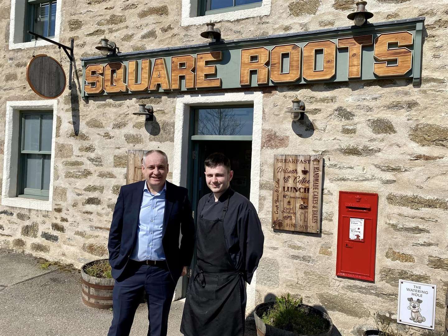 Moray's SNP MSP Richard Lochhead with Jordan Mathers outside of Square Roots.