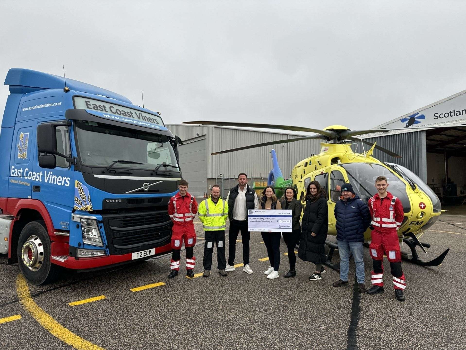 Staff from East Coast Viners and Spratt's presented a cheque to the Scottish Charity Air Ambulance.
