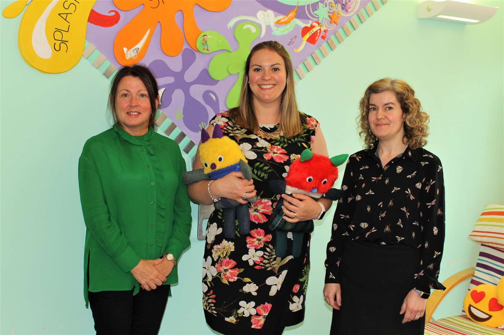 Staff of CLAN's children and family service which has received significant funding.