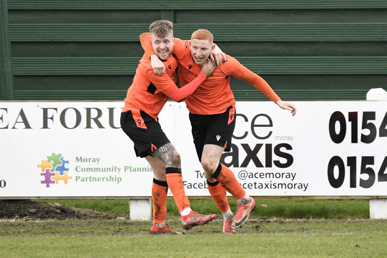 Aidan Wilson (right) celebrates as the Rothes score 1-0.  Photo: Daniel Forsyth