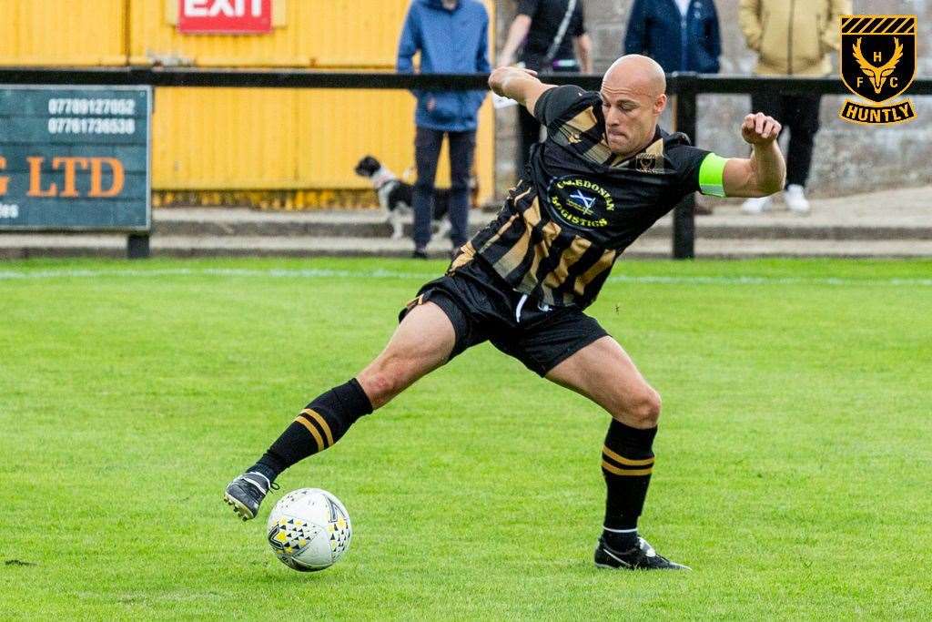 On the ball during his testimonial - Alex Thoirs. Photo: George Mackie