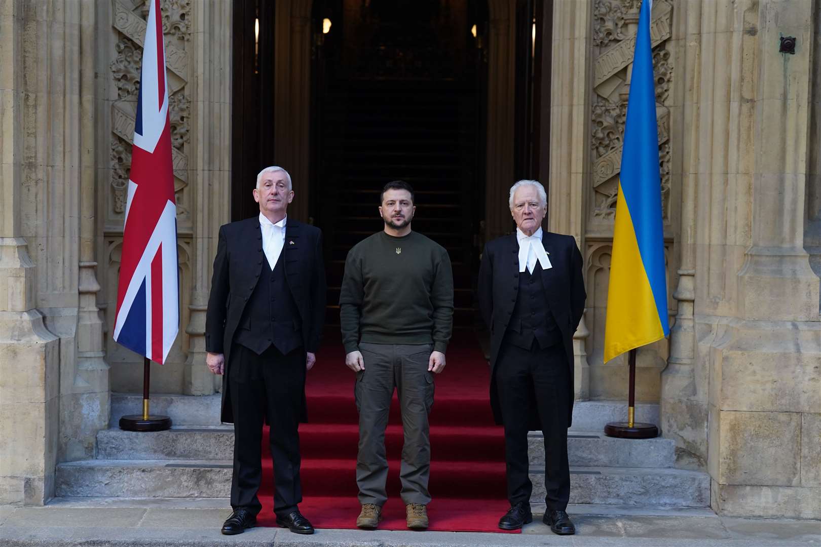 Sir Lindsay Hoyle and Speaker of the House of Lords Lord McFall welcome Ukrainian President Volodymyr Zelensky to Westminster Hall (Stefan Rousseau/PA)