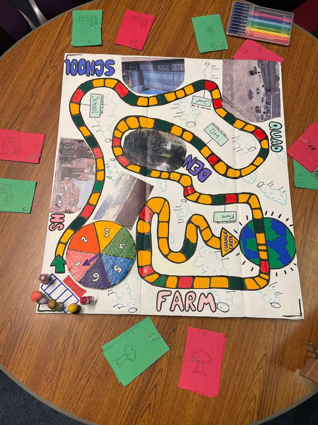 Pupils created a board game to highlight environmental issues.