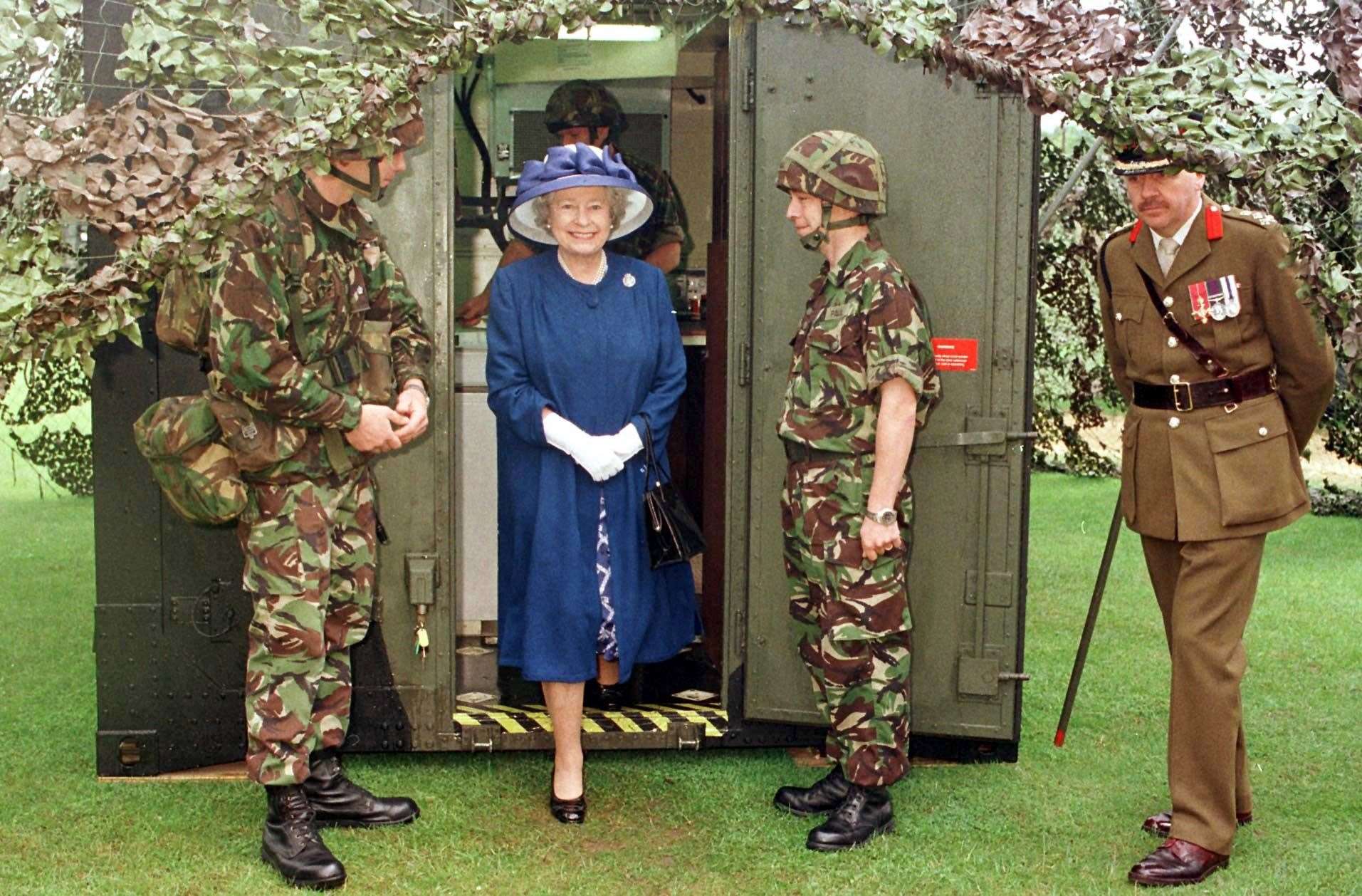 The Queen, as Colonel-in-Chief of the Corps of the Royal Engineers, visits the 42 survey Engineer Group at Denison Barracks in Hermitage, Berkshire, in 1998 (Tim Ockenden/PA)