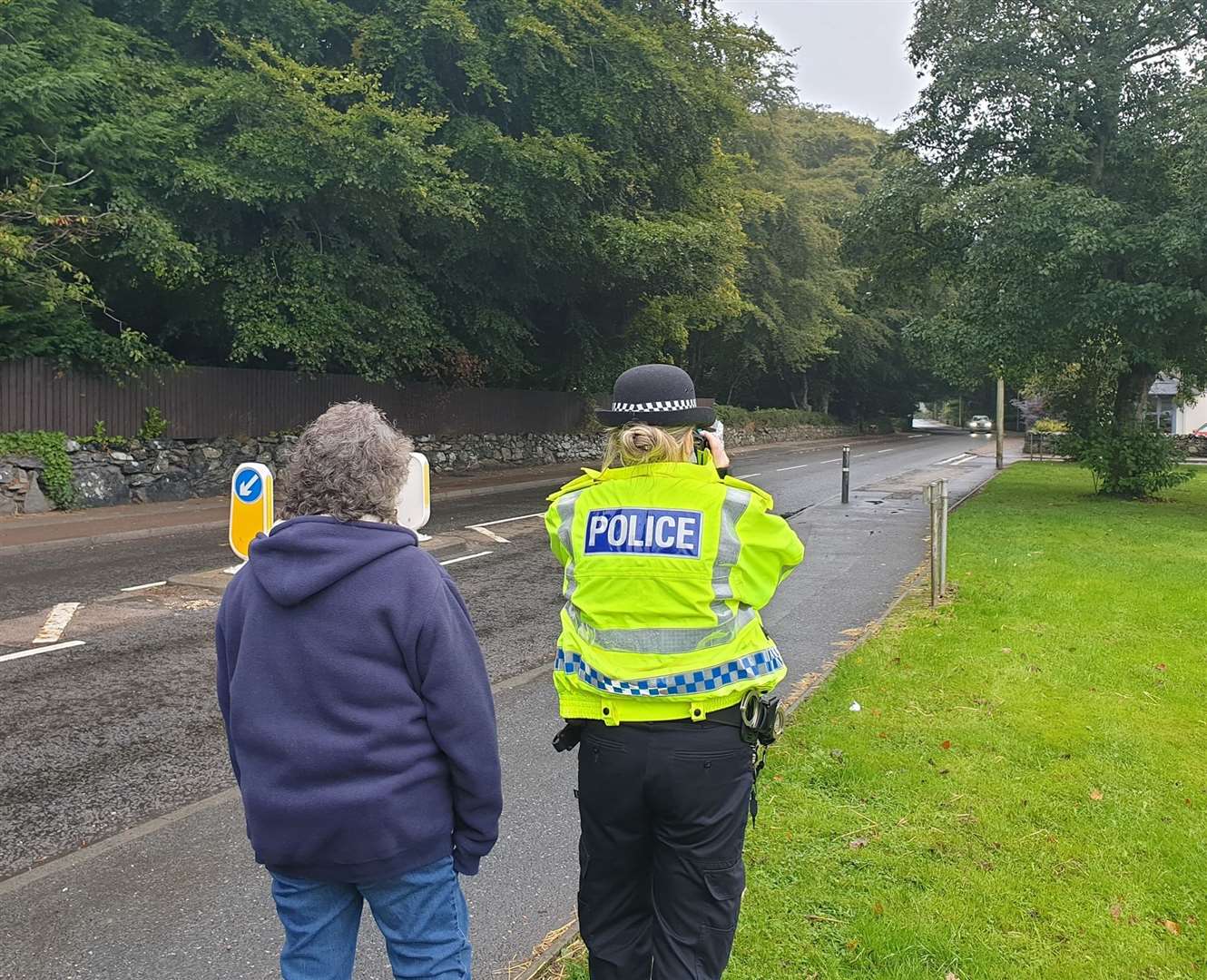Councilor Owen (left) joined officers as they carried out speed checks in Ellon