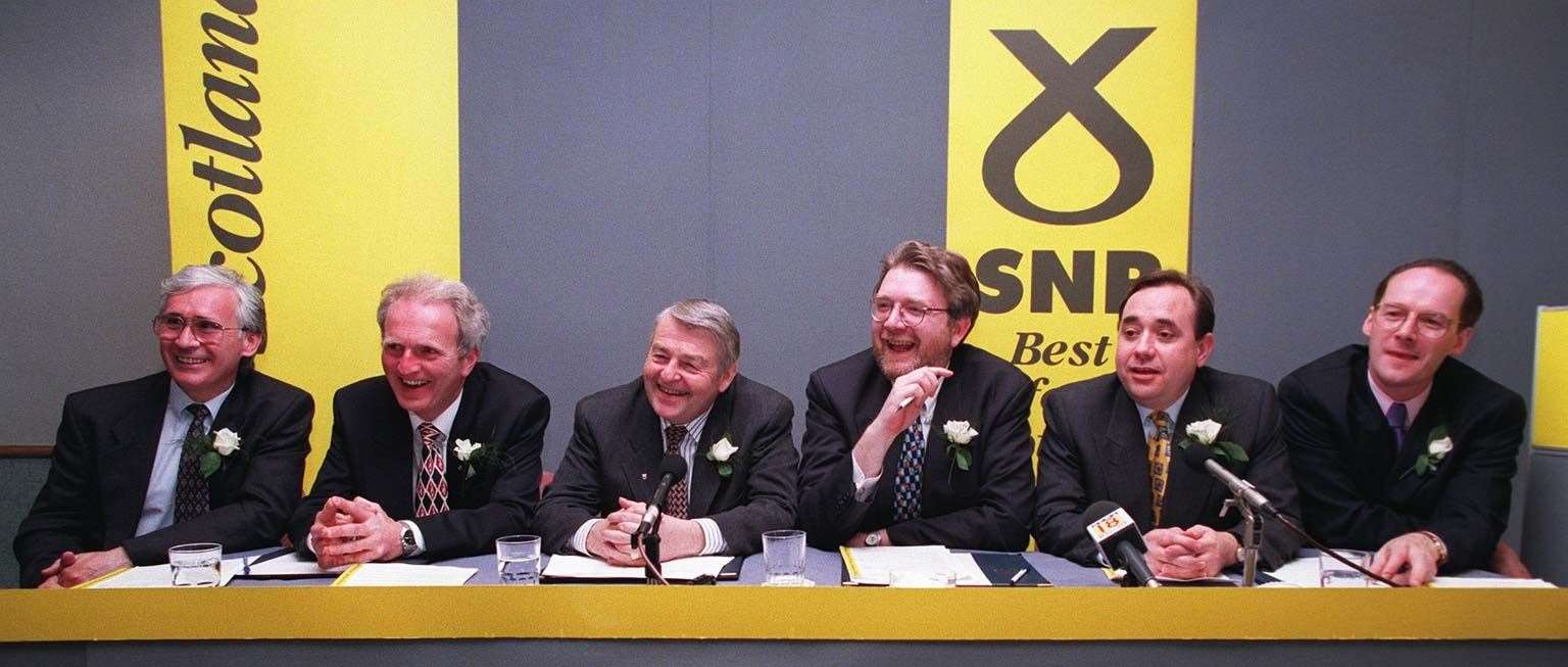 Mr Welsh, left, served alongside Alex Salmond and John Swinney on the SNP benches at Westminster (PA)