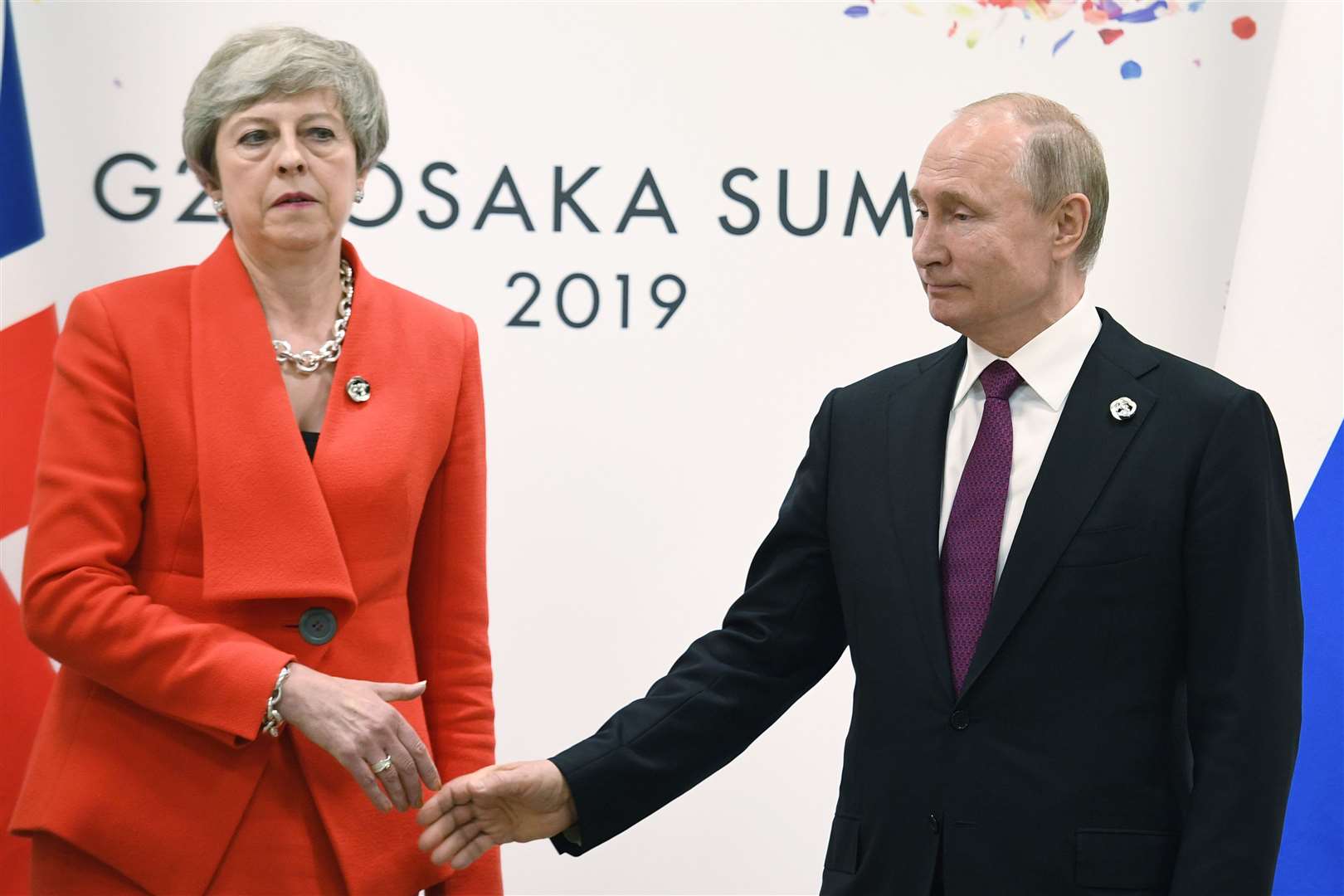 Russian President Vladimir Putin with former PM Theresa May