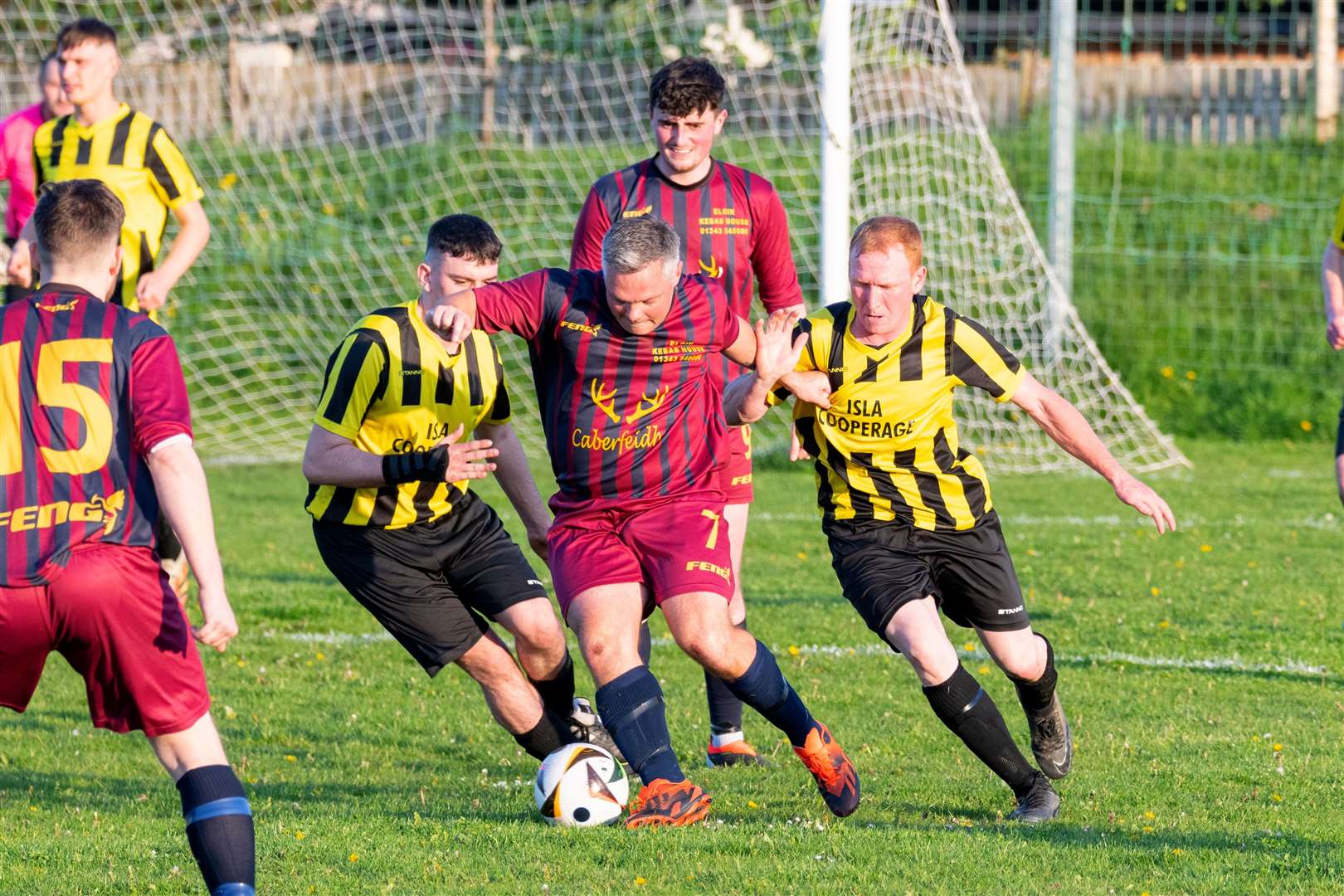 Seaforth's Graeme Wilson is sandwiched between Ugie's Michael Simpson and Levi Taylor. Picture: Beth Taylor