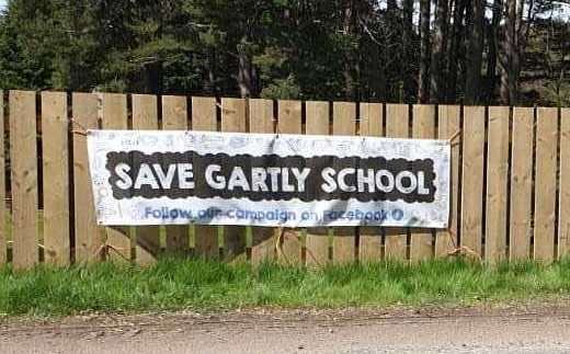 The community launched a campaign to save the school.