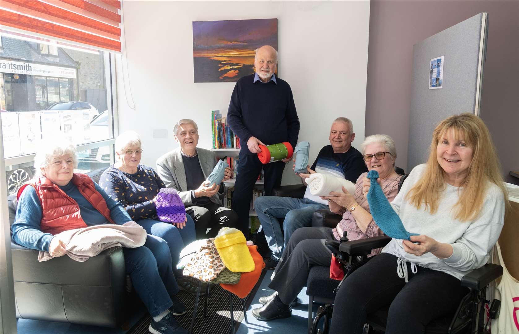 Displaying some of the types of items to be funded by the grant are (from left) Linda McDonald, Annabelle McLean, David Thompson (Moray Firth Credit Union) BAF chairman Gordon McDonald, Kevin McKay, Ailsa Foulds and Dee Hamilton. Picture: Beth Taylor