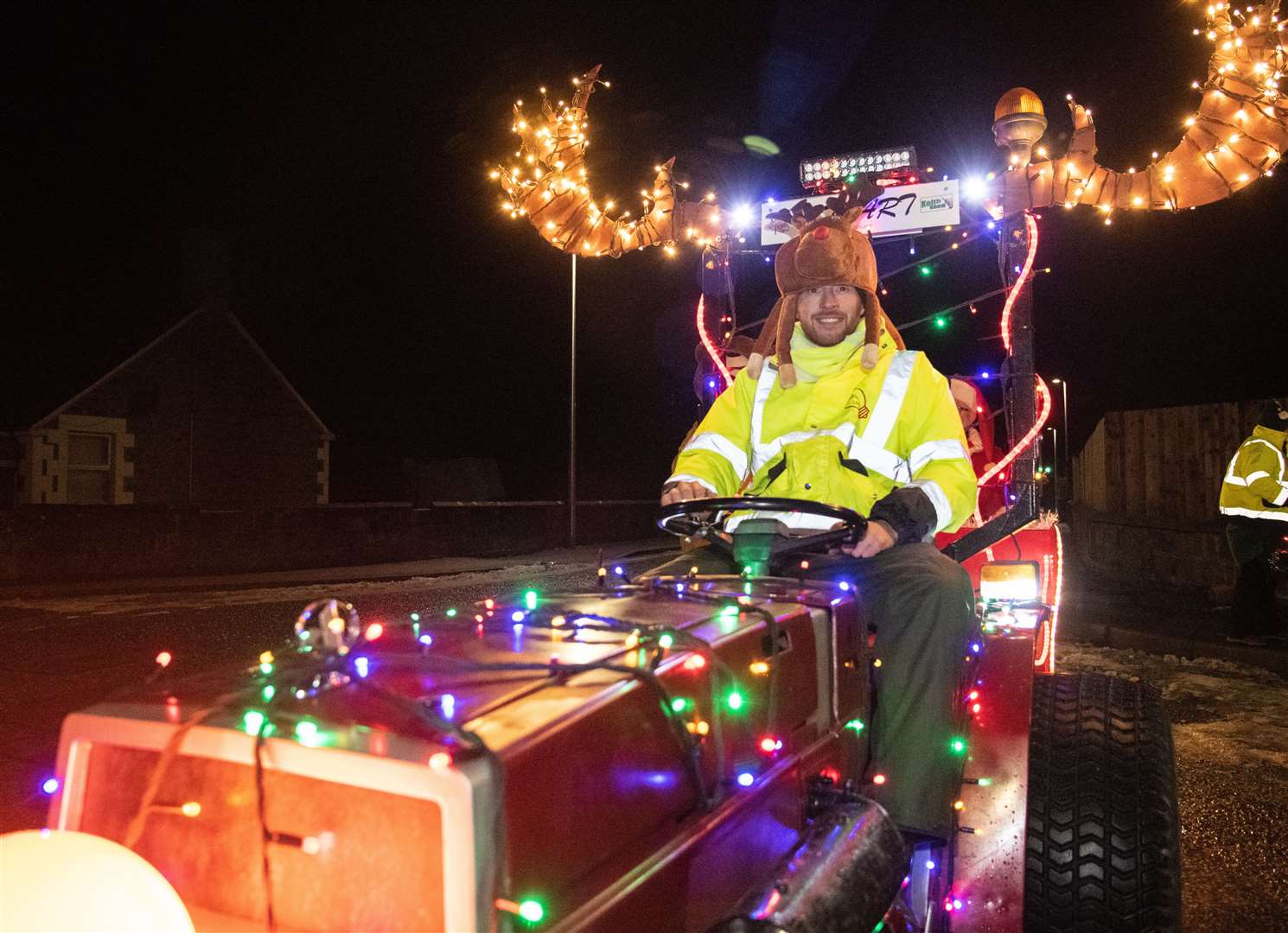 Callum Stuart on his tractor, towing Santa around town. Picture: Daniel Forsyth