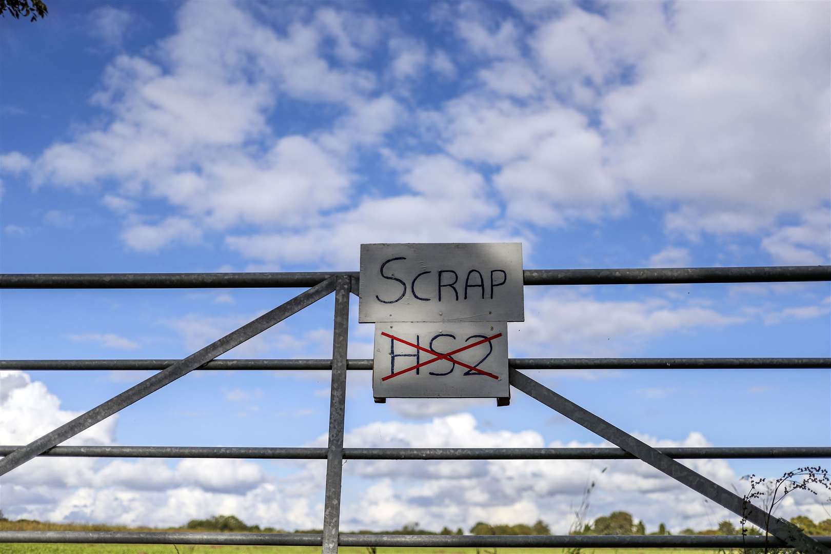 An anti-HS2 sign on a farmer’s gate in the Aylesbury Vale, Buckinghamshire (Steve Parsons/PA)