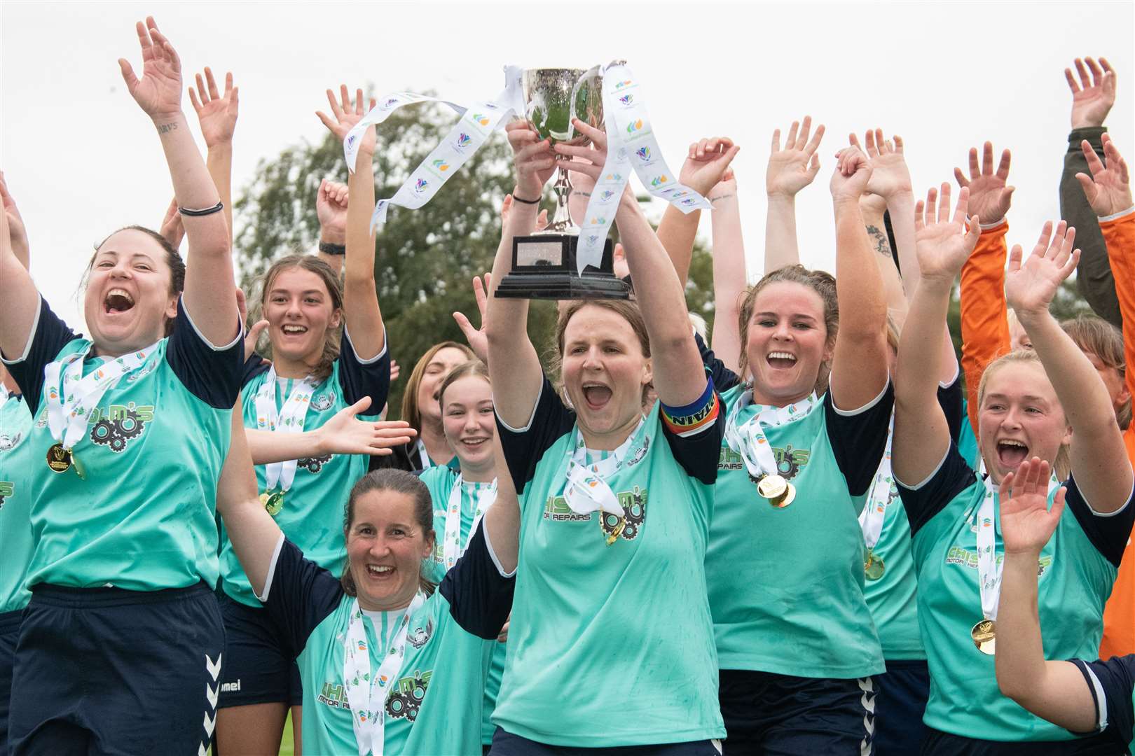 Buckie Ladies, seen here celebrating with the league trophy, have been nominated for the Scottish Power Sustainable Club of the Year honour. Picture: Daniel Forsyth