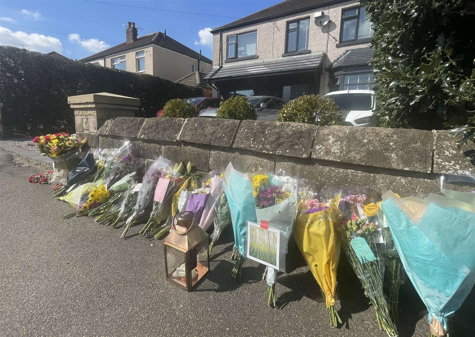 Floral tributes were left outside a house in Greenhill, Sheffield (Dave Higgens/PA)