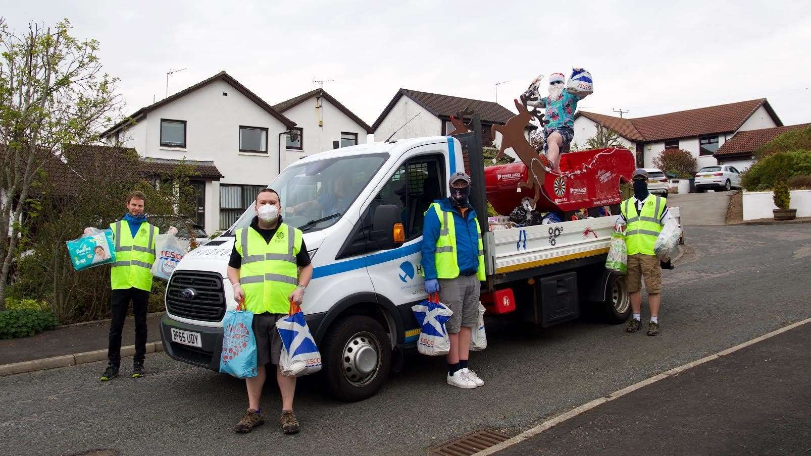 Members of Ellon Round Table helped Santa on his rounds of Ellon. Picture: Phil Harman