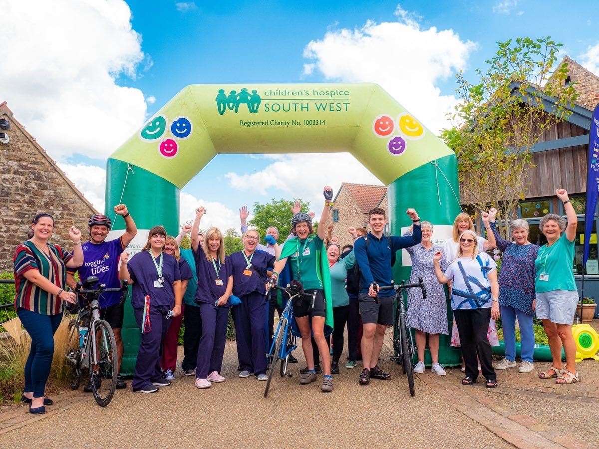 Ms Lennon (centre in green) at her 54th and final children’s hospice (ChatUK/PA)