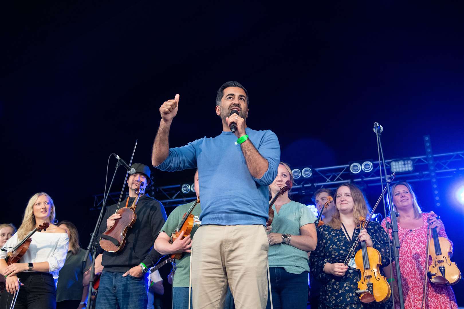The First Minister says a few words and introduces the 'Auld Fochabers Fiddlers' on the stage. ..First Minister for Scotland Humza Yousaf pays a visit to Fochabers music festival Speyfest...Picture: Daniel Forsyth..
