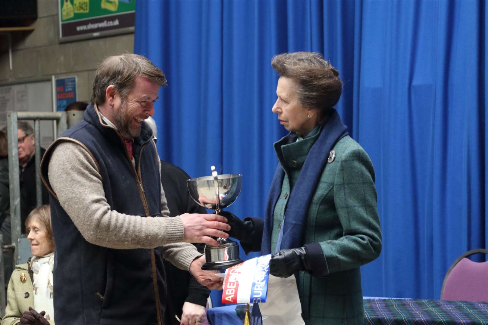 Overall champion Raymond Irvine is presented with the trophy by HRH The Princess Royal. Picture: David Porter.