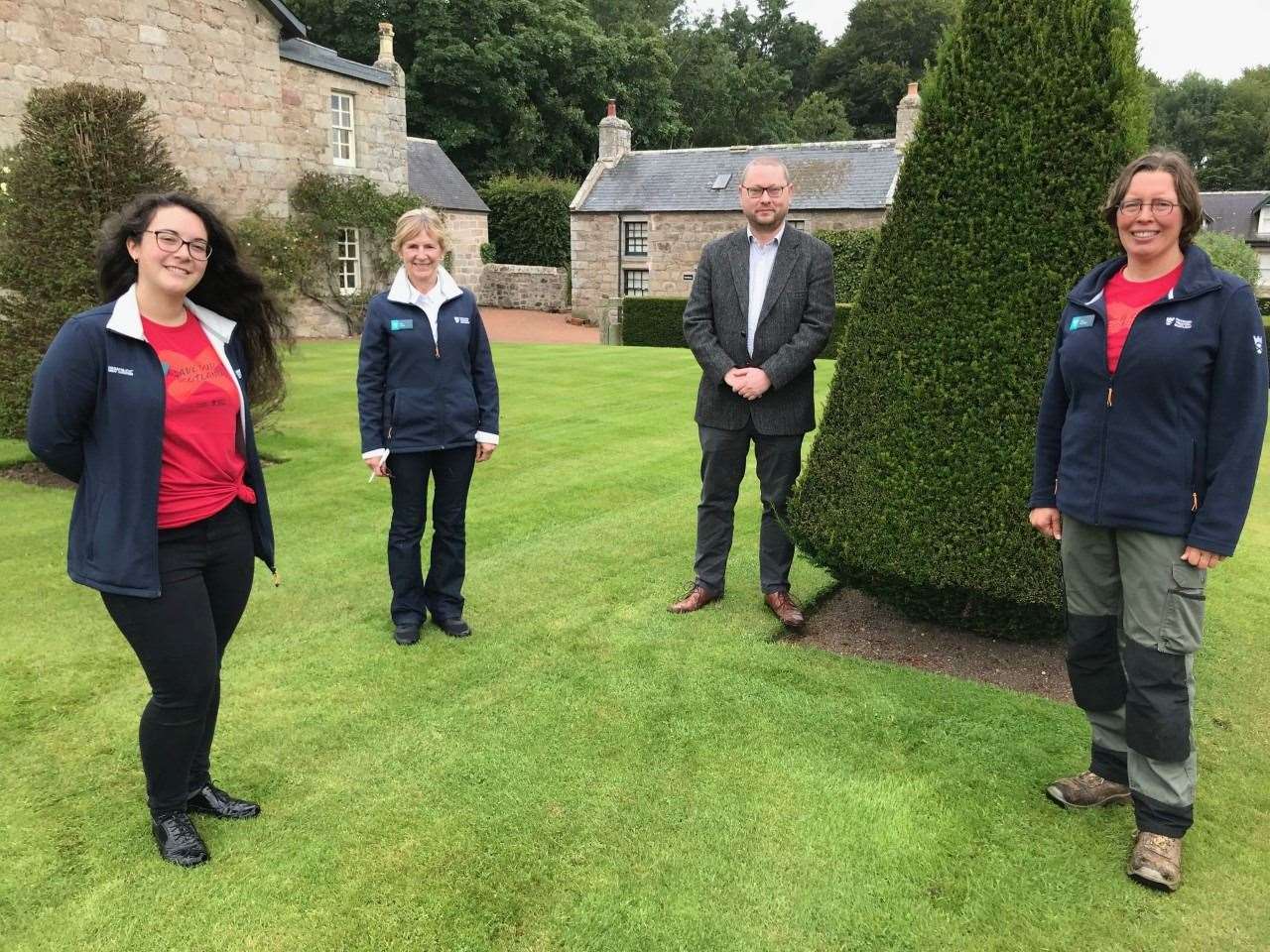 Gordon MP Richard Thomson with Pitmedden Garden staff.