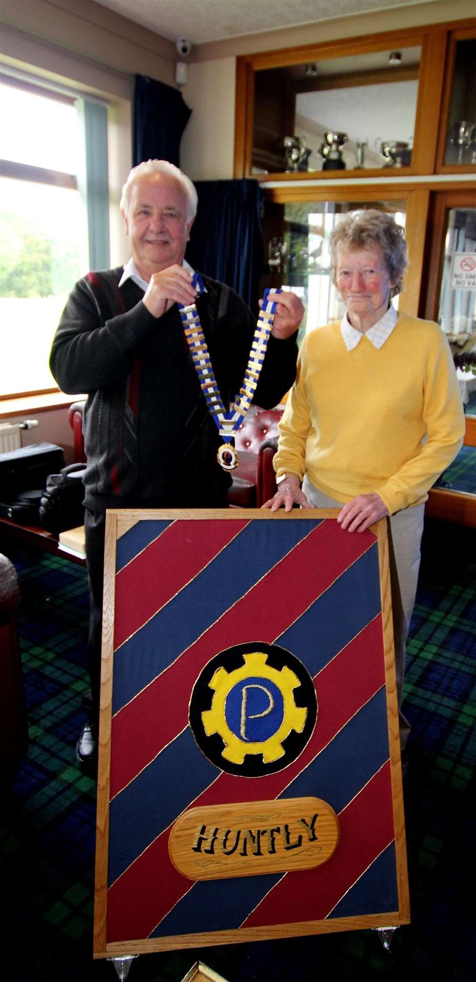 The chain of office is handed from Derek Alexander to Ian Rennie to Linsday Taylor. Picture: Ian Rennie