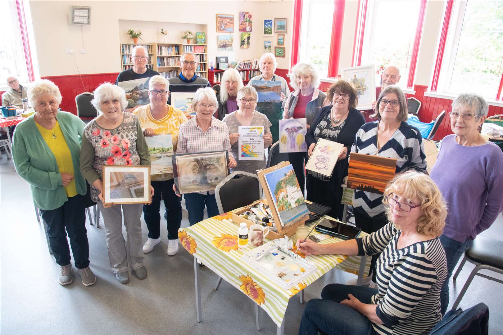 Portgordon Art Group members are putting the finishing touches to their annual exhibition. Picture: Daniel Forsyth