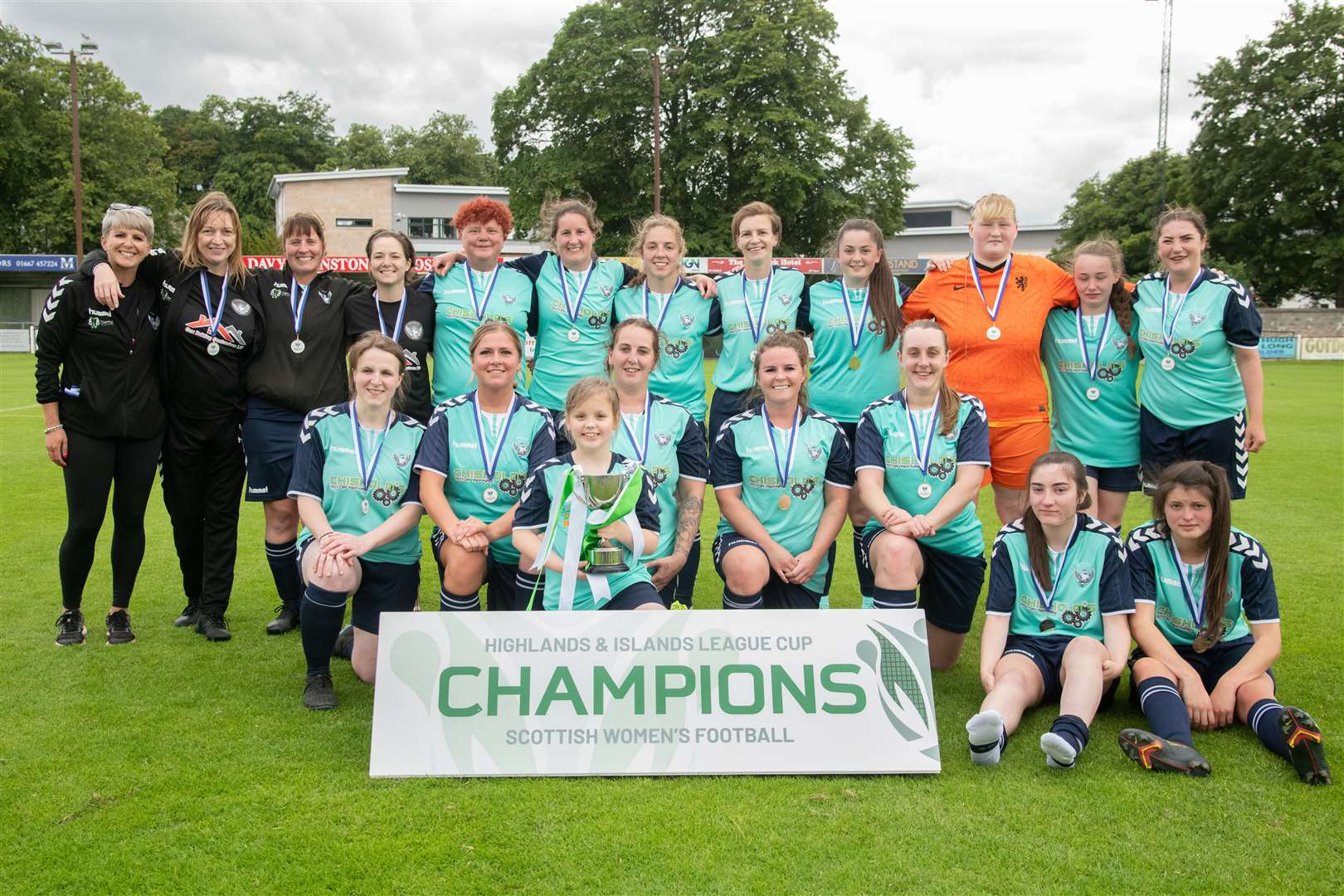 Feeling just champion...Buckie Ladies proudly show off the Highlands and Islands League Cup. Picture: Daniel Forsyth