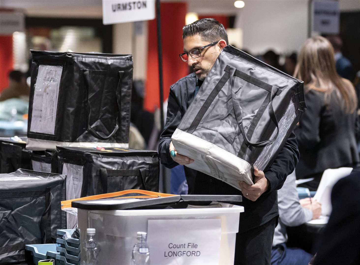 Ballot boxes arrive to be counted at Old Trafford for the Stretford and Urmston by-election (Danny Lawson/PA Wire)