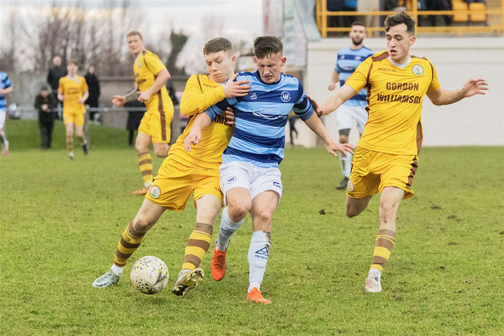 Lewis Crosbie (centre) has made the switch from Banks O' Dee to Huntly. Picture: Beth Taylor.